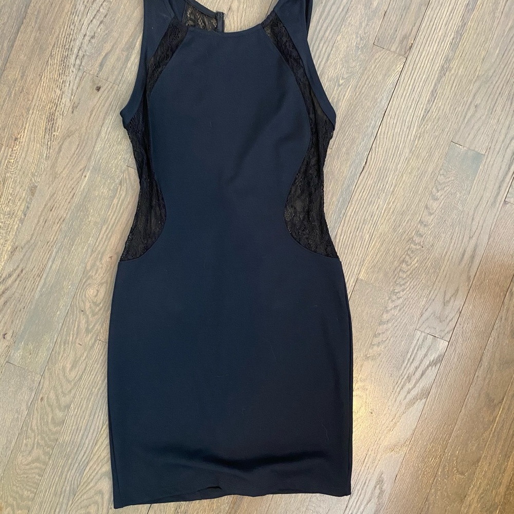 Black dress with lace mesh sides. Size small